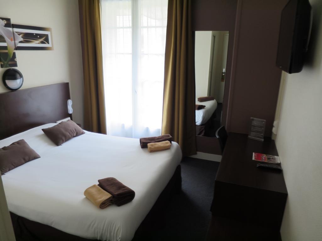 Hotel de la Paix Caen Habitación foto
